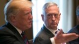 U.S. -- U.S. Secretary of Defense James Mattis (R) listens to U.S. President Donald Trump speaking during a luncheon with the Baltic States Heads of Government at The White House in Washington, April 3, 2018