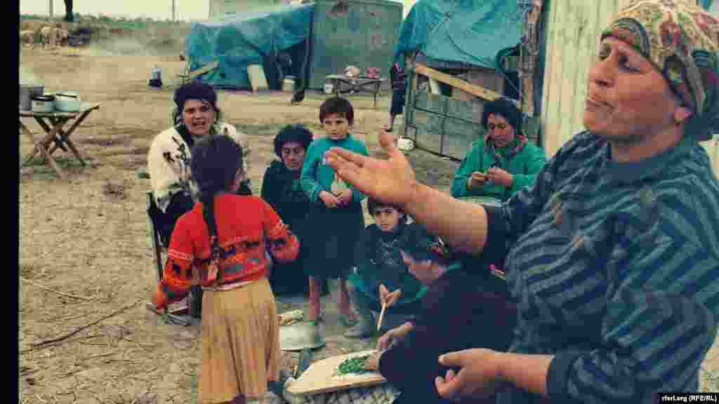 Ethnic Azerbaijani displaced persons from Agdam and the Karabakhi town of Shusha are seen in 1992, as full-fledged fighting over Azerbaijan's breakaway Nagorno Karabakh region began. Nearly 30 years later, some ethnic Armenian civilians, in turn, fled the Agdam district for a school in the Karabakhi-controlled town of Martakert, 27 kilometers to the north of the town of Agdam.&nbsp;