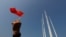HONG KONG--A pro-China supporter waves a national flag at Harbour City, during China's National Day, October 1, 2019.