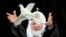 Russia -- Russian Orthodox Patriarch Kirill releases a white dove to mark Annunciation Day at the Kremlin in Moscow, April 7, 2020