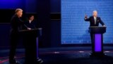 USA-ELECTION - U.S. President Donald Trump and Democratic presidential nominee Joe Biden participate in their first 2020 presidential campaign debate held on the campus of the Cleveland Clinic at Case Western Reserve University in Cleveland, Ohio, U.S., S