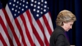 U.S. -- US Democratic presidential candidate Hillary Clinton steps down a staircase after making a concession speech following her defeat to Republican President-elect Donald Trump, in New York, November 9, 2016