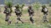 UKRAINE -- Soldiers take part in an exercise at the Yavoriv military training ground, close to Lviv, September 24, 2021