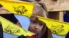 UKRAINE – A Ukrainian girl attends a mass by Pope John Paul II at Chayka airport on the outskirts of Kyiv June 24, 2001