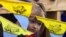 UKRAINE – A Ukrainian girl attends a mass by Pope John Paul II at Chayka airport on the outskirts of Kyiv June 24, 2001