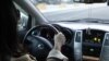 Kyrgyzstan - generic, Kyrgyz woman, driving, car, auto, Bishkek