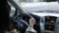 Kyrgyzstan - generic, Kyrgyz woman, driving, car, auto, Bishkek