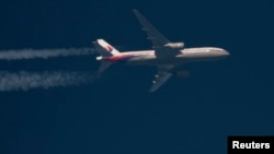 Боинг 777 компании Malaysia Airlines, потерянный 8 марта 2014 года. Архивное фото (5 февраля 2014)