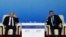CHINA -- Russia's President Vladimir Putin, left, and Oleg Deripaska, CEO of UC Rusal attend the APEC CEO Summit at the China National Convention Center (CNCC) in Beijing, November 10, 2014