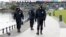 RUSSIA -- Russian police officers wearing face masks to protect against coronavirus patrol an area of the Ostankino Pond in Moscow, May 20, 2020