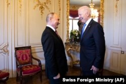 Russian President Vladimir Putin (left) talks with U.S. President Joe Biden during the two leaders' June 2021 summit in Geneva, Switzerland.