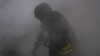 Ukraine -- Rescue workers fighting fire in Sumy region after a Russian strike, 15May2025 