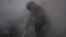 Ukraine -- Rescue workers fighting fire in Sumy region after a Russian strike, 15May2025 