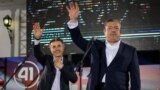 Экс-премьер Грузии Бидзина Иванишвили и нынешний премьер Гиорги Квирикашвили на выборах в парламент 