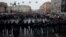Saint Petersburg, Russia - Law enforcement officers block a road as protesters march along the Nevsky Avenue during a rally in support of jailed Russian opposition leader Alexei Navalny