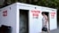 A woman walks past a bomb shelter in Sevastopol, the main base for Russia's Black Sea Fleet, in the Crimean peninsula, on July 22, 2026, amid the Russian-Ukrainian conflict.