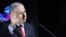 ISRAEL -- Israeli Prime Minister Benjamin Netanyahu waves as he attends the Muni World conference in Tel Aviv, Februray 14, 2018