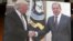 U.S. -- House Oversight and Government Reform Committee ranking member Rep. Elijah Cummings (D-MD) walks past a photograph of President Donald Trump and Russian Foreign Minister Sergei Lavrov during a news conference at the Capitol in Washington, May 17, 