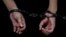 A person in handcuffs at Moscow's Basmanny District Court