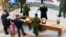 Russia -- People seen at a desk promoting contract service in the Russian army at Kaliningrad's Europe trade center as part of the "Contract Service in the Russian military is your choice!" campaign marking Defender of the Fatherland Day, Kaliningrad, Fe