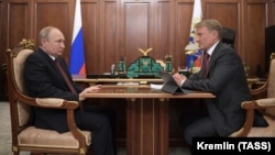 Глава Сбербанка Герман Греф с Владимиром Путиным