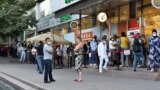 Almaty, Kazakhstan - People queue outside a pharmacy amid the outbreak of the coronavirus disease (COVID-19)