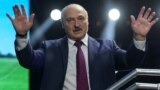 Belarusian President Alexander Lukashenko waves to his supporters at the forum of Union of Women in Minsk, Belarus September 17, 2020. Tut.By via REUTERS ATTENTION EDITORS - THIS IMAGE WAS PROVIDED BY A THIRD PARTY. MANDATORY CREDIT