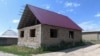 Парламент Кыргызстана легализовал постройки на самовольно захваченных землях