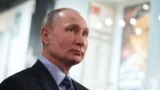 RUSSIA -- Russian President Vladimir Putin visits the cultural centre and museum Vysotsky's House at Taganka ahead of the 80th anniversary of birth of poet and singer Vladimir Vysotsky in Moscow, January 24, 2018
