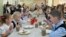 Russia - a child eats in the dining room