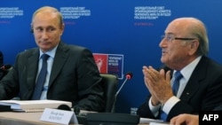 Владимир Путин с главой FIFA Зеппом Блаттером, 28 октября 2014 года 