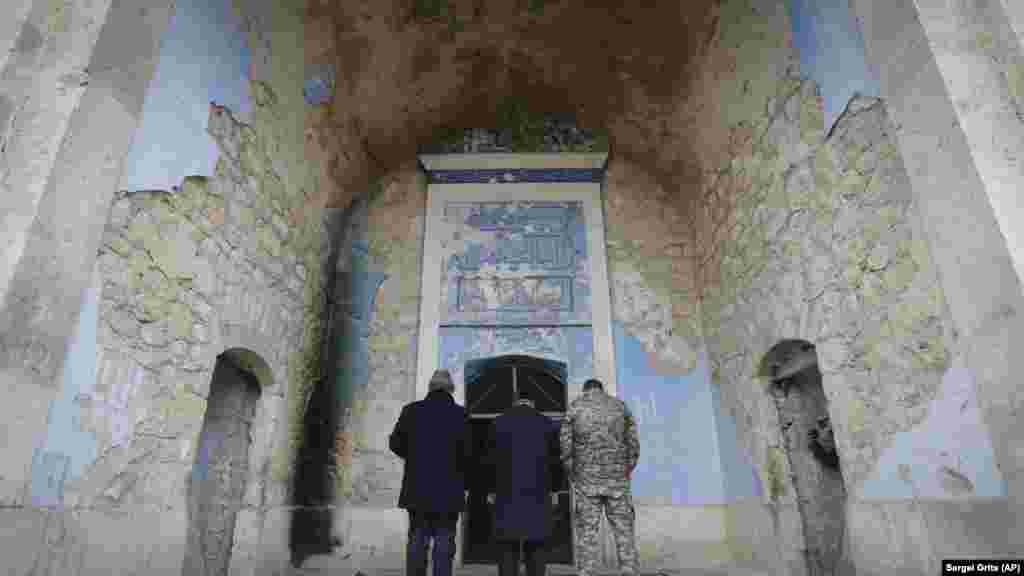 NAGORNO-KARABAKH -- Azerbaijanian religion officials and military officer pray in Mosque in Aghdam, after the Azerbaijani forces handed control that had been occupied by Armenian forces for a quarter-century, Aghdam, November 20, 2020