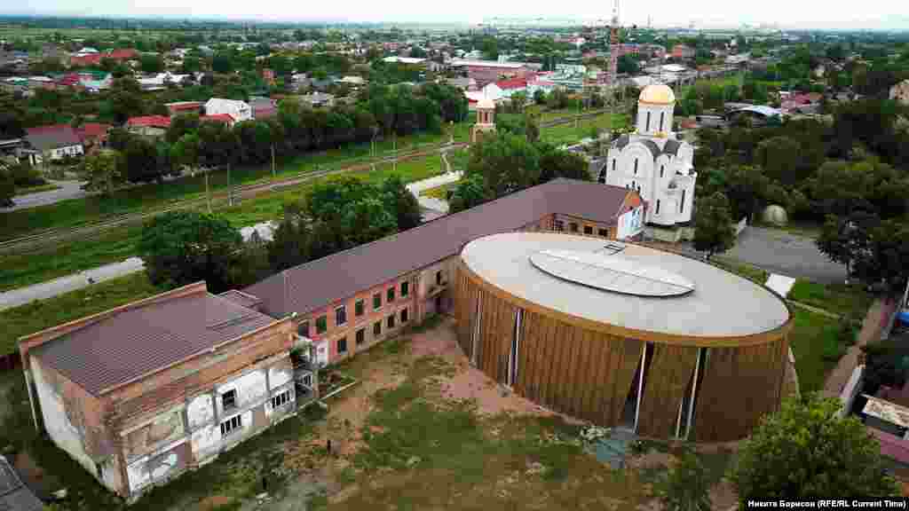 Bulldozers came to tear down School No. 1 a few months after the hostages&#39; burial. Mothers of the slain children came to defend the site.&nbsp; Later, the boiler room, workshops, and the elementary-school building were dismantled during construction of the memorial complex.&nbsp; In their place, construction of a Russian Orthodox church began in 2012. Icon painters promise that all of those killed in School No.1 will be depicted on its walls. &nbsp;