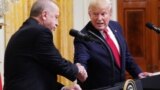 U.S. -- U.S. President Donald Trump and Turkish President Recep Tayyip Erdogan (L) take part in a joint press conference in the East Room of the White House in Washington, November 13, 2019