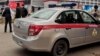 RUSSIA-SHOOTING -- A car of Russia's National Guard is seen at the scene after a gunman opened fire at the Perm State University in Perm, Russia September 20, 2021. REUTERS/Anna Vikhareva NO RESALES. NO ARCHIVES