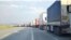 Long line of trucks Mako Customs Iran-Turkey border