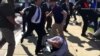 Охрана турецкого президента подралась с протестующими в США