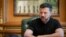 In this handout photograph taken and released by the Ukrainian Presidential Press Service on May 26, 2025, Ukraine's President Volodymyr Zelensky speaks during a phone call with Albania's Prime Minister as he sits at his desk in his office in Kyiv, amid t