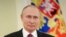 RUSSIA -- Russian President Vladimir Putin addresses on the occasion of the Day of the National Guard Troops, in Moscow, March 27, 2021.