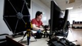 BELARUS -- A programmer of Game Stream company, branch of Wargaming, works on a computer in Minsk, March 18, 2016
