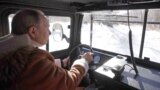 RUSSIA -- Russian President Vladimir Putin sits behind the wheel during a holiday in the Siberian taiga, March 21, 2021