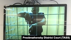 Aleksei Navalny appears via video link during a court hearing in Moscow on June 25.