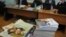 Stacks of booklets of a Jehovah's Witnesses in Russian court 