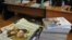 Stacks of booklets of a Jehovah's Witnesses in Russian court 