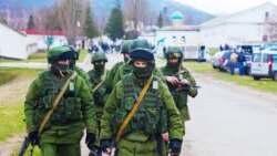 "Little green men" -- Russian military forces in Crimea in March 2014.