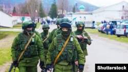 "Little green men" -- Russian military forces in Crimea in March 2014.