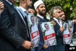 Демонстрация напротив здания саудовского консульства в Стамбуле в поддержку Джамала Хашогги. 5 окиября 2018
