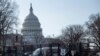 Washington -- US Capitol police officers and US National Guard soldiers guard an entrance to the Capitol grounds in Washington, DC, on March 4, 2021