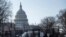 Washington -- US Capitol police officers and US National Guard soldiers guard an entrance to the Capitol grounds in Washington, DC, on March 4, 2021
