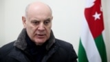 Abkhazian parliament member Aslan Bzhaniya gives an interview in the offices of the Administration of Abkhazia's President